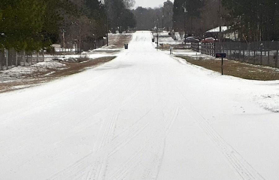 Pinewood Village Drive and every road in Montgomery County received inches of ice and snow in a winter storm Monday, Feb. 15. 