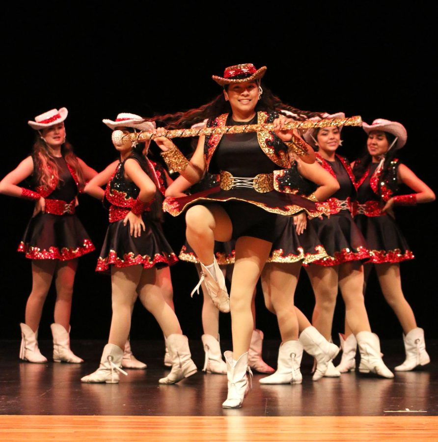 Aracely Rostro [11] performing with the Starlettes in Winter Wonderland. 