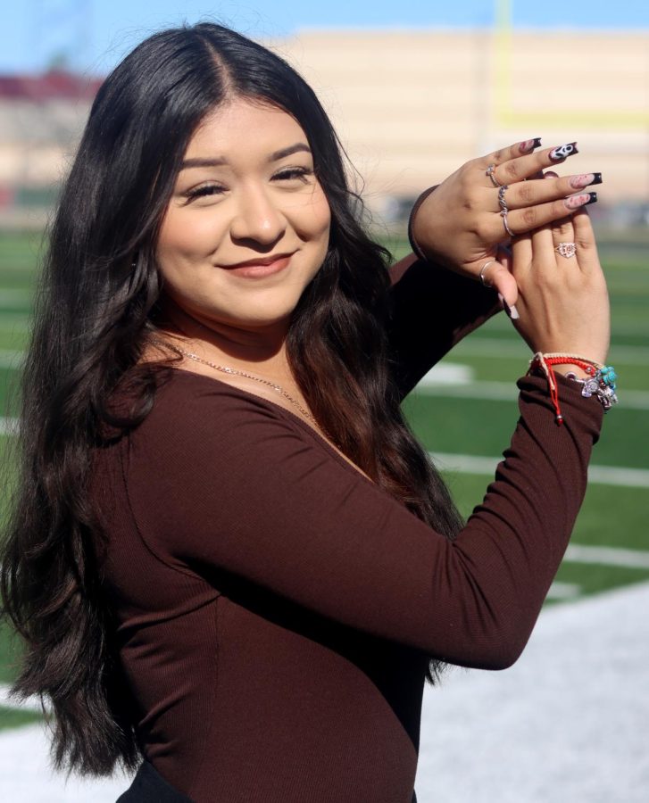BUSINESS WOMEN.Sophomore Brenda Badillo poses with her homemade halloween themed acrylic nails design. She began to do her sisters nails in 8th grade which gave her inspiration to begin her nail  business 2 months ago.”People come up to me 2 times a week to do their nails,” Brenda Badillo said.
