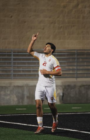 GLORY TO GOD: Junior Mario Rangel celebrates his goal against New Caney on March, 17. 2023. It was Marios last goal of his junior season and became the top goal scorer of the team. I just wanted to take that quick moment and thank god, Rangel said Ive come this far and all of my success I owe to god so hes a big part of my life