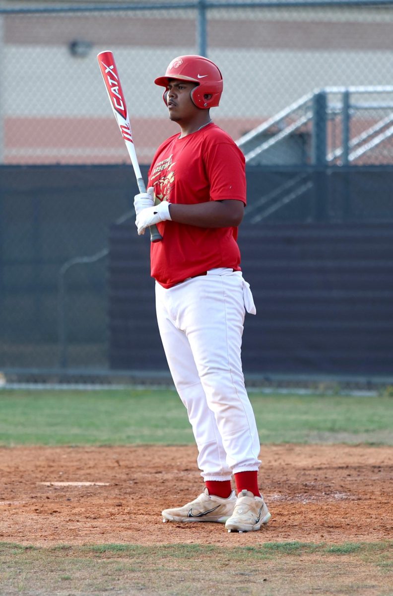 PLAY BALL. Senior Isaias Torres steps up to home plate and prepares to bat against the opposing teams pitcher on Sept. 6, 2023 at Caney Creek High School. Fall Ball games are only played by the varsity baseball team. 