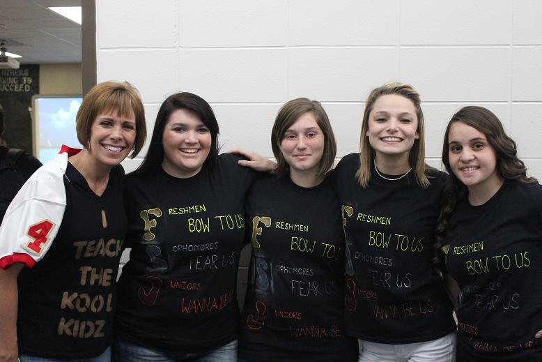 Seniors make matchinig black shirts to show class pride for the last Spirit Day of homecoming week. 