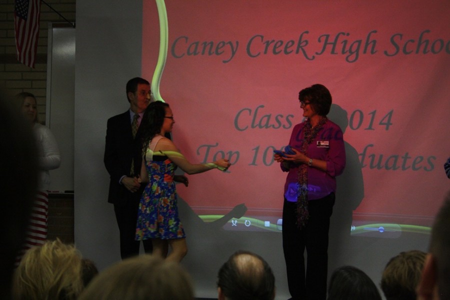 Laura Coleman collects her award from Mrs. Kahn