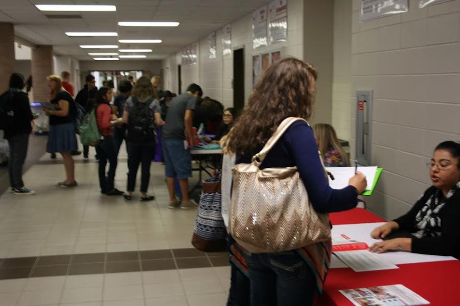 Students learning about a variety of colleges.