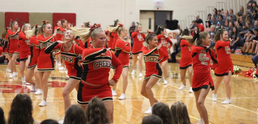 Caney Creek cheerleaders perform at the Meet the Panther pep rally. Several cheerleaders from the school squad will be traveling to New York City to participate in the Macys Thanksgiving Day Parade.