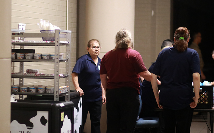 Cafeteria workers, who show up at the school early, brought out food and drinks for those stuck at the school.