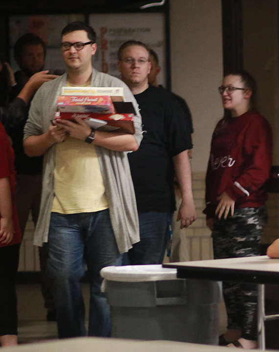 Teachers Stephen Green and Joseph Collatos brought board games, drinks and snacks from the team's storage room for the faculty and staff to eat and drink while waiting. Other teachers started gathering all the snacks in their offices and rooms to donate to the group also.