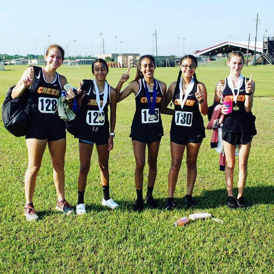 The girls cross country team at the Huffman meet.