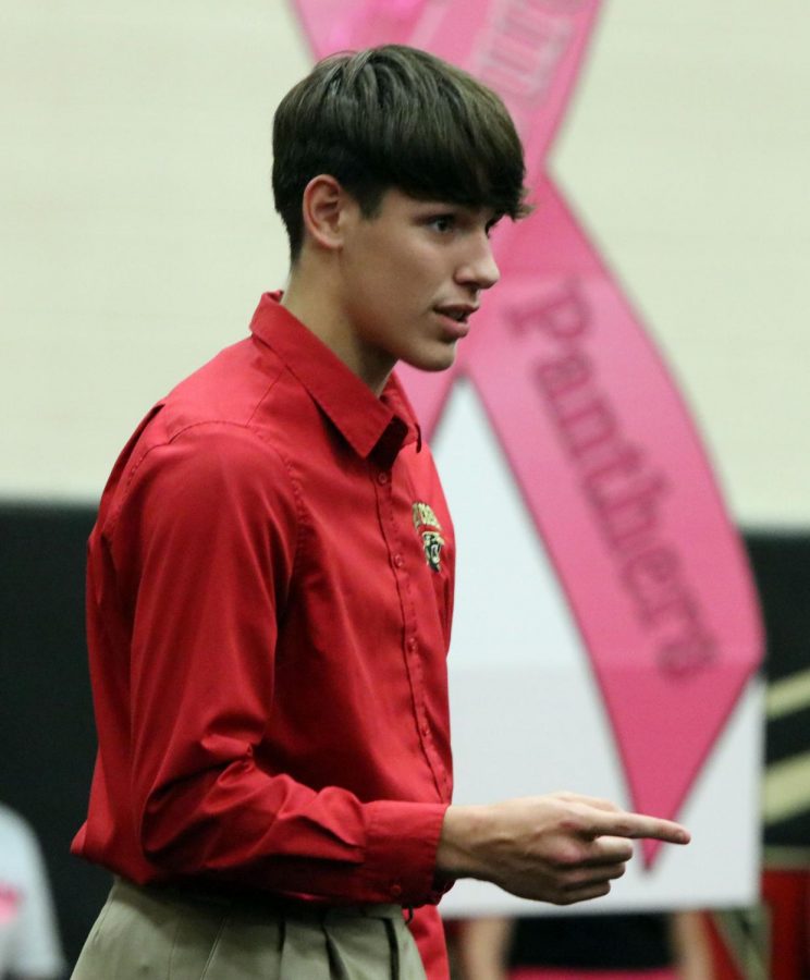 Evan Underwood [10] pretends to be Mr. Milam during pink out pep rally.