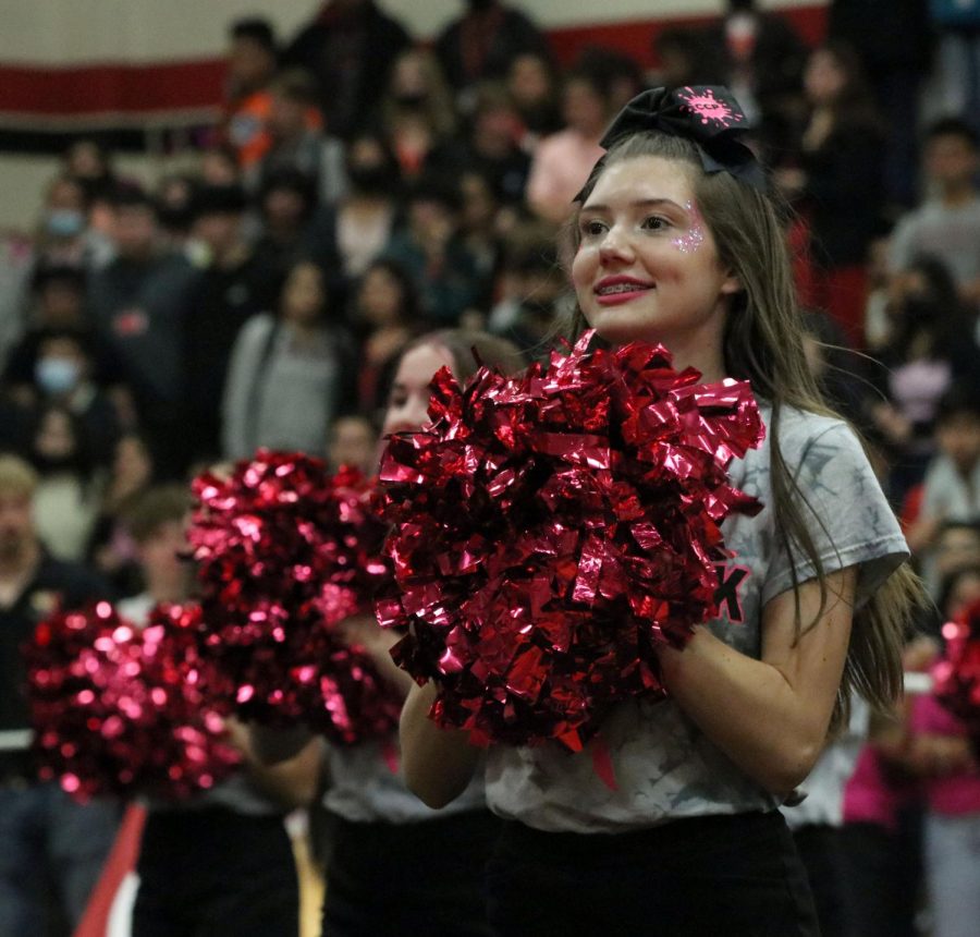 Jaylyn Bruce [10] cheers at pink out pep rally.
