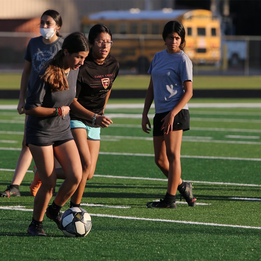 SKILLS. Liz Fierros [10] starting to play after waiting to play against others during soccer tryouts afterschool.  I was really nervous because the freshman were rally good so you had to really see where you passed and try to coordinate with your teammates where you would make a play, said Liz Fierros. 