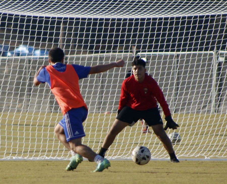 sophomore Eduardo Sanchez preparing to defend the goal.  