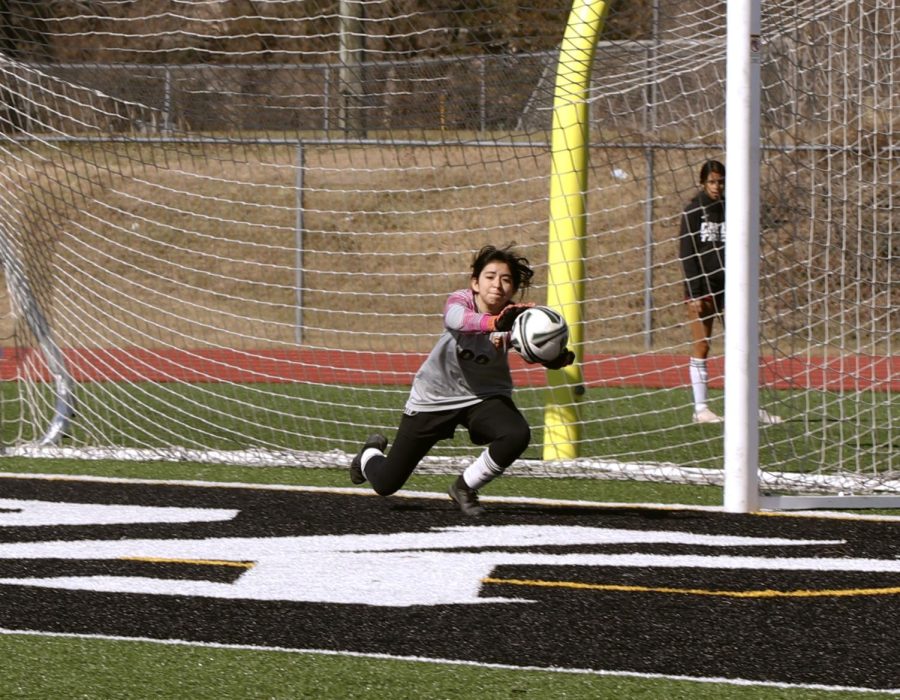 Jenna Villalobos (10) caught a save 