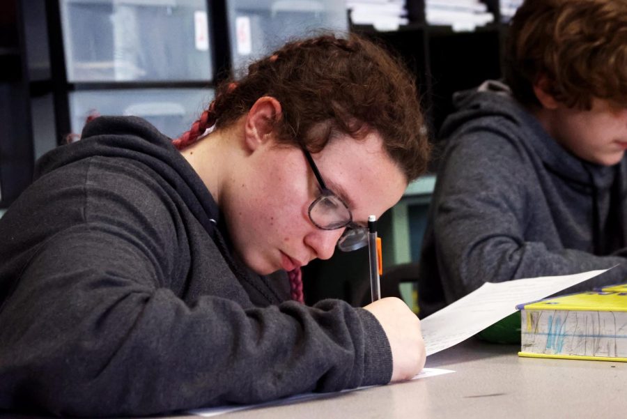 Christian Bryant 9th grade making rough draft for an essay about Romeo and Juliet
