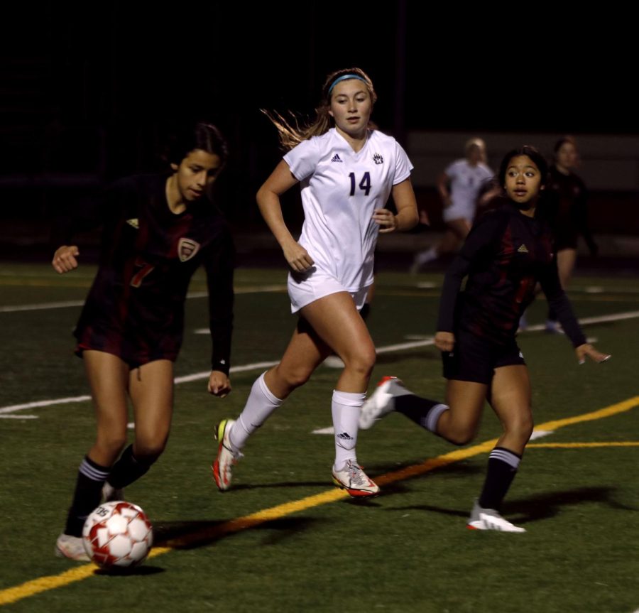 Liliana Sanchez (11) Leila Chicas (9) fight over the ball against opponent and get the steal.