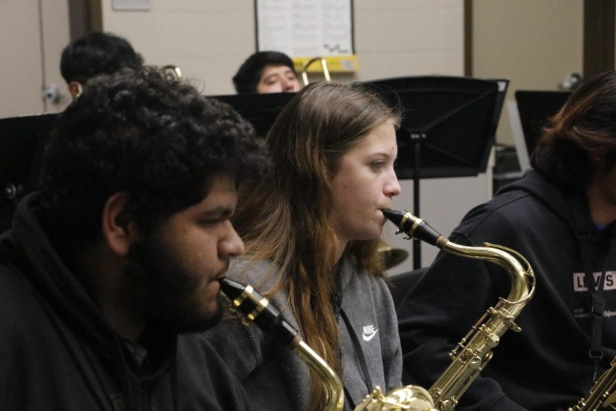 Alyssa Bishop playing her solo and working so hard ." its hard being the only tenner sax but I'm making the best of it" Alyssa said
