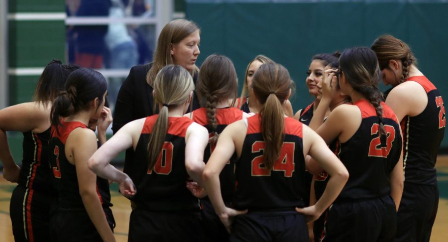 JV Coach Phillips talking to her team in half time.