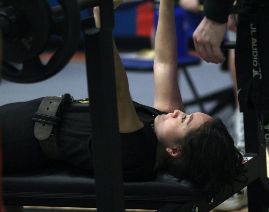 Senior Evelyn Popoca benches 125 at Grand Oak for the first powerlifting meet of the season.