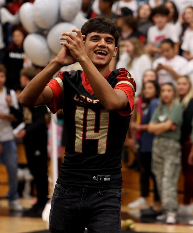 FEELING GLORIOUS. Junior Isaiah Sanchez smiles towards the classes in the Battle of the Classes pep rally on Oct. 28,2022. Sanchez enjoyed the feeling of participating in the pep rally and wishes to continue being part of them for the upcoming pep rallies. “I’d like to participate in more pep rallies because it’s something different that’s fun,” Sanchez said. 