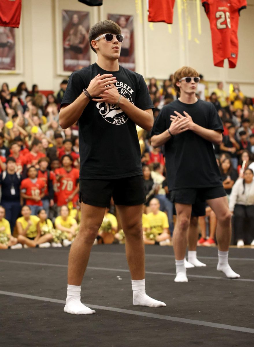 A-LIST. Senior Evan Underwood performs a dance as part of The Creek Squads act on Sep. 15, 2023. Underwood is not only an actor but he also narrates and helps lead the school’s pep rallies as an emcee. “For it being my last Battle of the Classes pep rally it felt like a surreal experience going from freshman year with Covid and not really experiencing a true freshmen year,” Underwood said. “Now I am a senior emceeing all the pep rallies and a lead in theater, it really showed me how much Ive grown.”