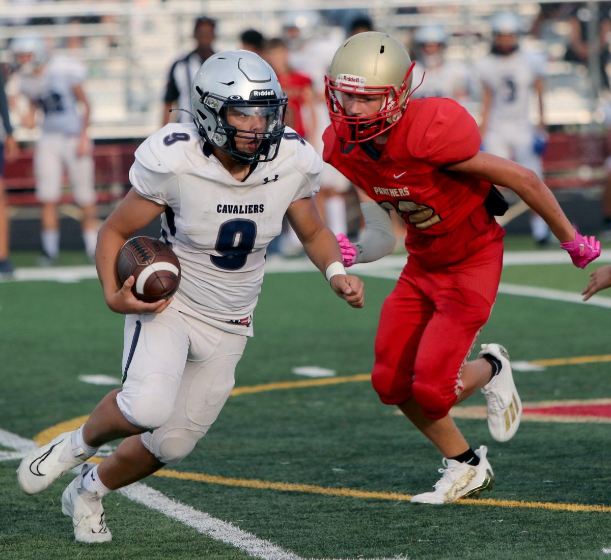 COMING IN HOT. Freshman Devin Acrey chases down a College Park player and goes in for the tackle during the freshman gold game against on Sept. 28, 2023. Acrey was able to tackle the opposing team, and successfully stopped his advances.
