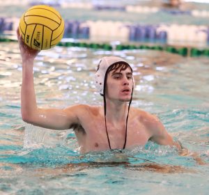 PASS IT. Junior George Macaluso looks for someone on his team to pass the ball to on Wednesday, Sep. 27, 2023. Macaluso made most of the goals during the game against Grand Oaks. “I was just trying to get the ball round because I was scoring the most points,” Macaluso said. “They put a lot of pressure on me to pass the ball around so I tried to do that throughout the game.”
