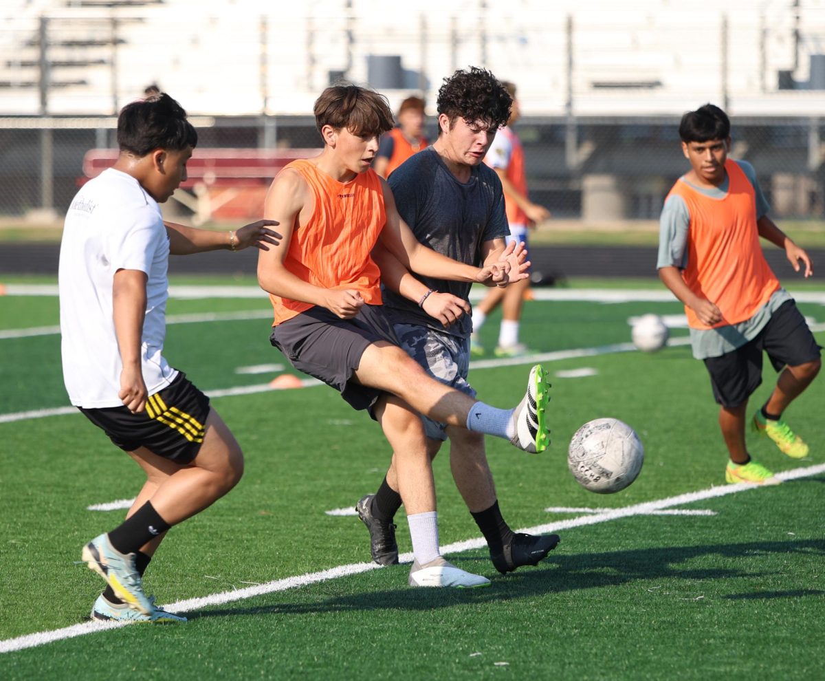 GIVE IT MY ALL. Junior Santiago Arroyo Garcia practices with other soccer players on Thursday, Sept. 28, 2023. After transferring from Spain to the U.S. Garcia plays on junior varsity as a center midfielder. “I feel nervous about soccer season coming up, Garcia said. “I know Im not the best player, but my buddies from soccer are helping a lot and I want to give everything I got with maximum effort.”