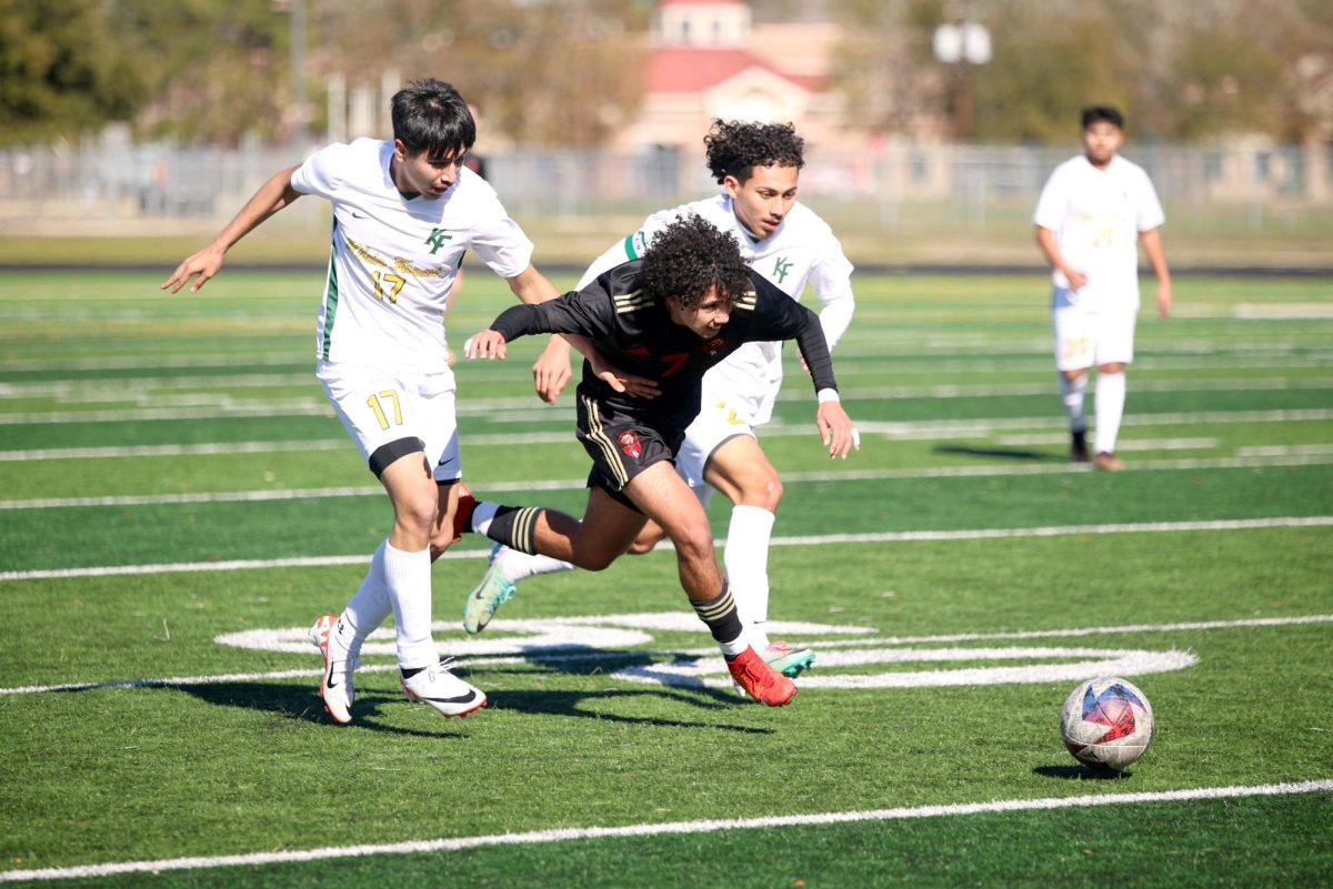 BREAKTHROUGH. Senior Cristian Claros turns up as he pushes past Klein Forest’s defense allowing him to make a play to his teammates. The team won the first game that counts toward their seasonal record. “I’m really excited for this new season,” Claros said. “I felt really good that we started off the season with a 4-1 win, and theres many more wins to come.” 
