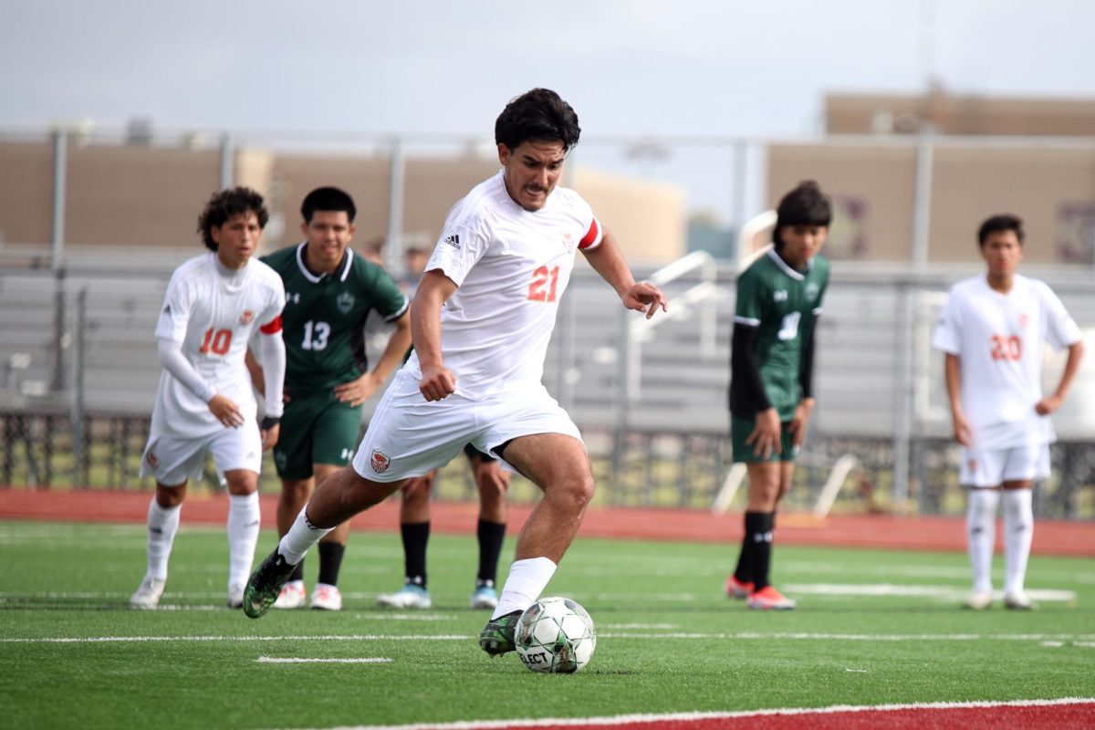 STARTING OFF STRONG. Senior Mario Leon Portillo takes a penalty shot against Huntsville on Thursday, Jan. 11, 2024 at Summer Creek High School. Portillo was successful on his shot and started the panthers off with a 1-0 lead. 