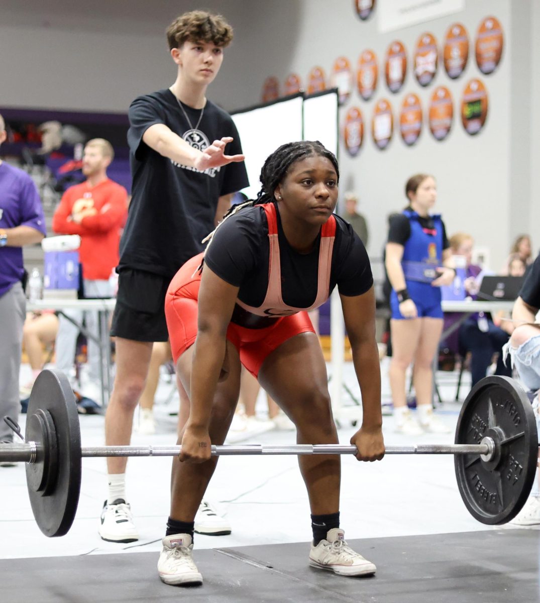 START. Sophomore ZiaYiah Bookman deadlifting on Saturday, Feb. 3, 2024 at Willis High School. Bookman started her deadlift with her first attempt being 160 lbs  then proceeding to 200 lbs and 232 lbs at the end. “To be honest, I could have gone higher but stayed low,” Bookman said. “Going forward I need to keep pushing, you know, step out and do something.”  
