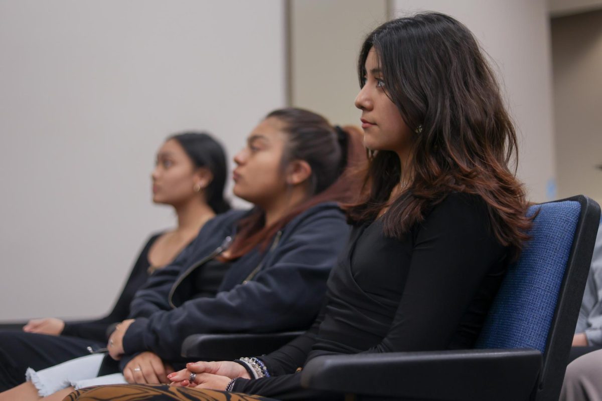 LISTENING EARS. Senior Sarai Martinez- Galindo and the rest of the NTHS officers practice their speeches before the ceremony begins on Monday, Feb. 26, 2024. Martinez is the president of NTHS, practicing the speeches helped show support for her fellow officers. 
