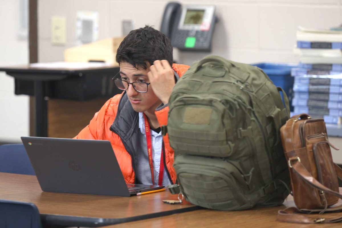 NEW START.Junior Jordy mejia types his essay on Monday, Feb. 26,2024.The Ready Writing is a new club at Caney Creek.“We started writing essays for the UIL competitions,” Mejia said.“ We put our brains to the  test by trying to write essays from just quotes.”
