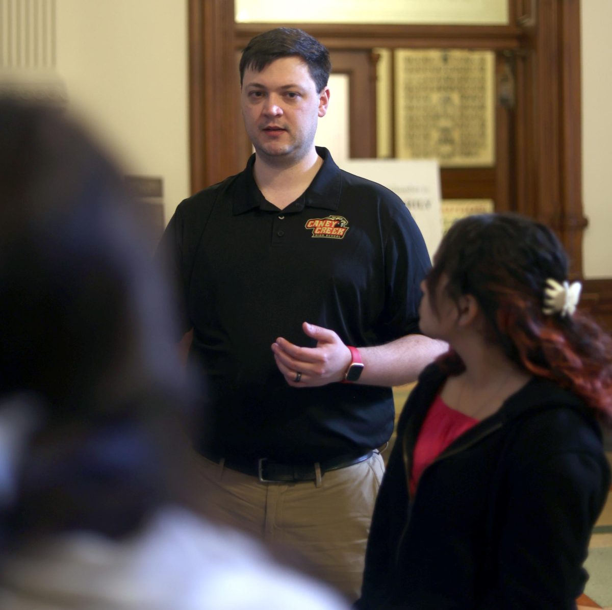 Adviser Stephen Green talks with editors in the Student Media program about how the Texas Legislature works while on a trip to the state Capitol Building on April 19, 2024. The annual trip to the capitol is part of the spring ILPC State Convention that Student Media editors go to for professional development.