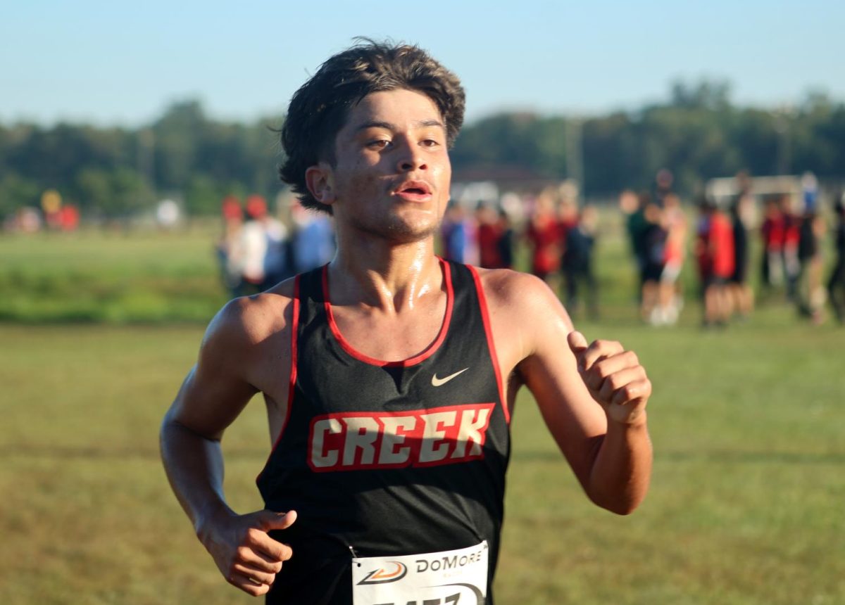 SPEEDING. Freshman Juan Balderas reaching the finish line at Tony Munson Liberty Invitational on September 27. He was able to run to the end. “I felt exhausted, I could barely walk,” Balderas said.
