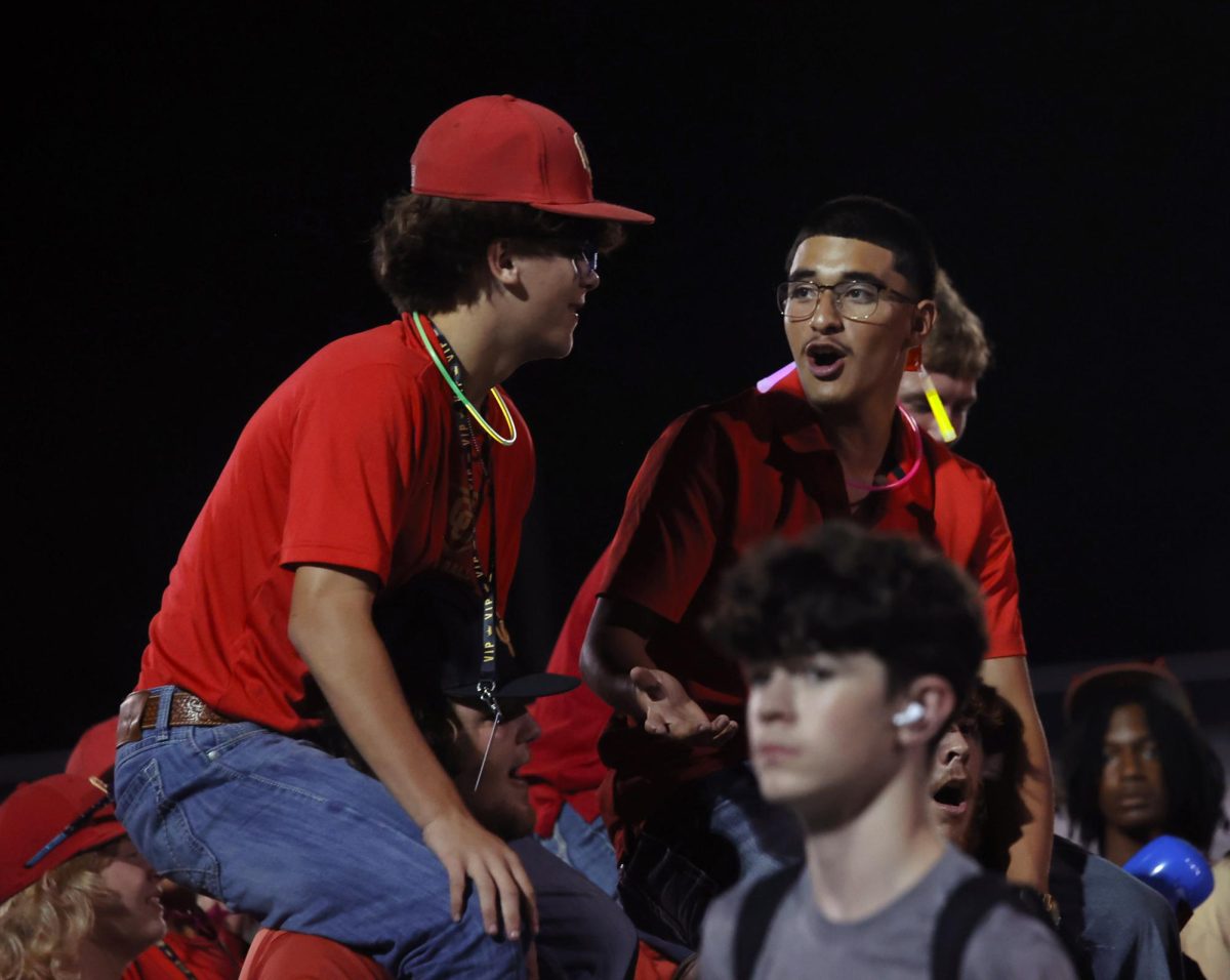 ALL TOGETHER. Junior Anthony Carbajal and Sophomore Matthew Fagan talking to each other while sitting on their teammates shoulders on Wednesday, Nov. 6, 2024.
