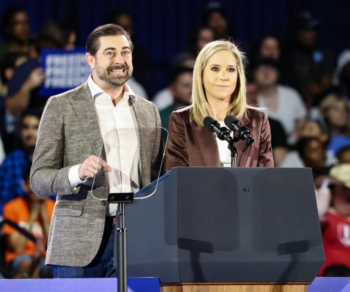 IT'S REAL. Guest speakers Amanda Swarovski, and Josh Swarovski speak at the podium for the Kamala Harris rally held in NRG Stadium on Oct. 25. Amanda and Josh spoke on their personal experience with abortion. Josh specifically called for men to support Harris and fight abortion laws. “I want to tell every last voter, including each and every man out there, that this is our fight too. The decision about the fight that's right, and the decision about if and when to start a family should be ours to make, not Donald Trump's,” Josh said. “That's why we need to elect Vice President Harris,  and Representative Colin Allred.”