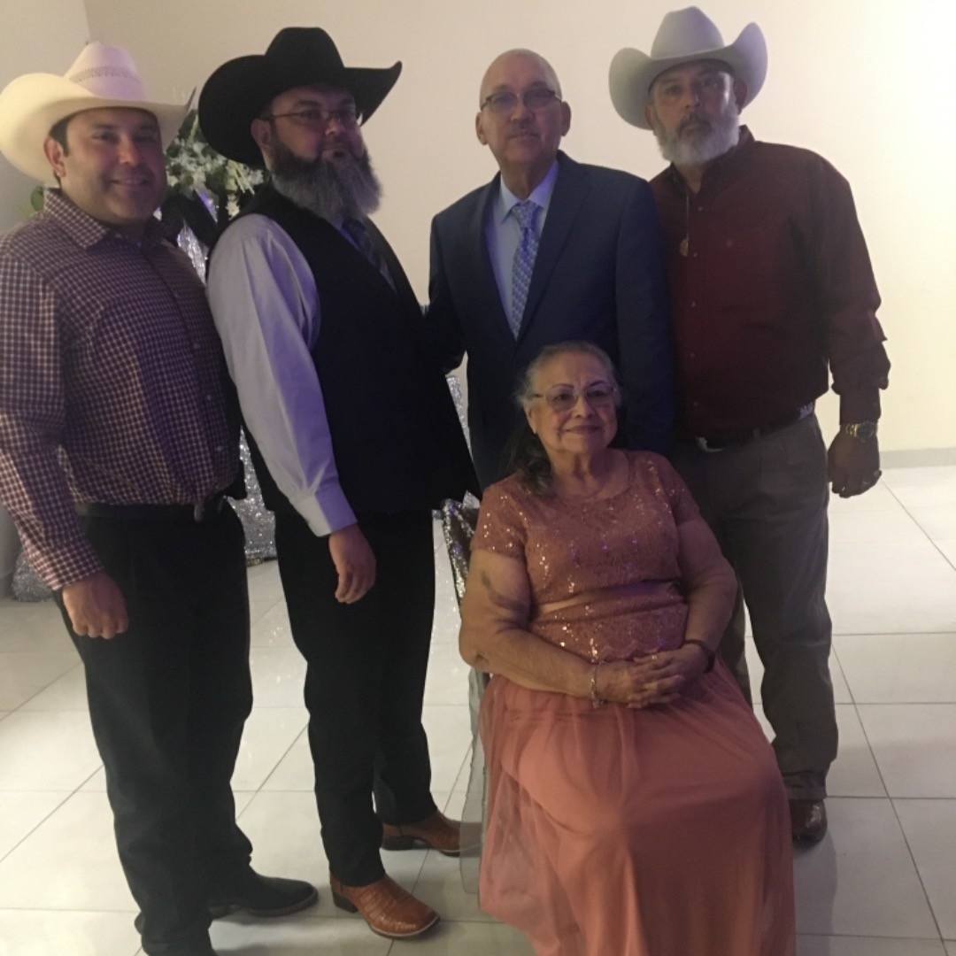 Spanish teacher Rene Hinojosa with three of his brothers and his mother posing for a photo posted on Instagram  on Oct. 3 2021.