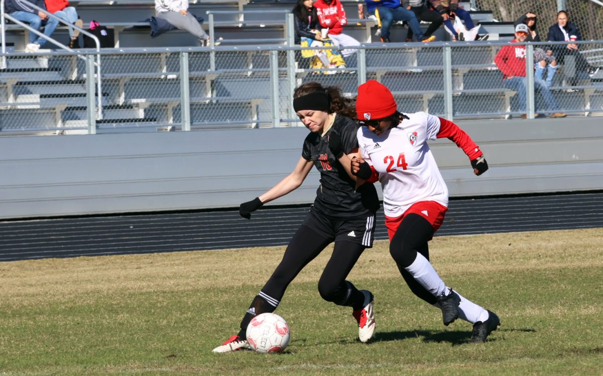 FIGHT. Sophomore Ava Aldridge fights to keep the ball against Crosby high school Saturday Jan. 11, 2025.