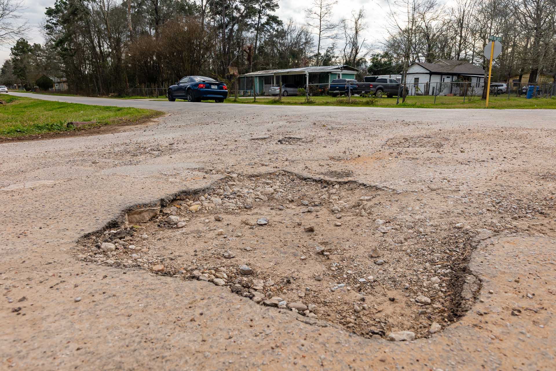 A large pothole in the middle of an intersecting back road on Feb. 28 at White Oak Blvd.