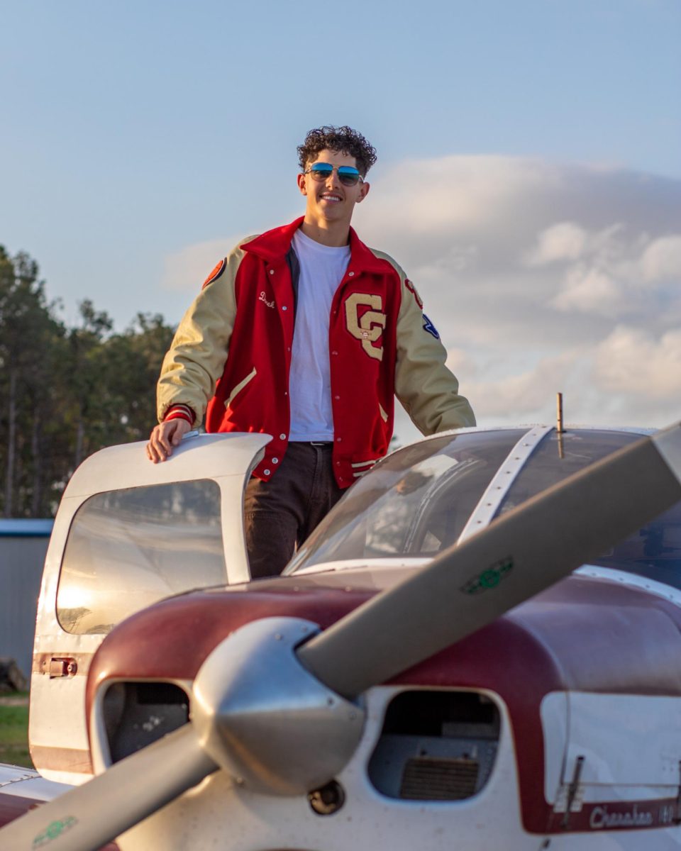 Senior Derek Darkenwald atop his airplane submitted from Instagram.
