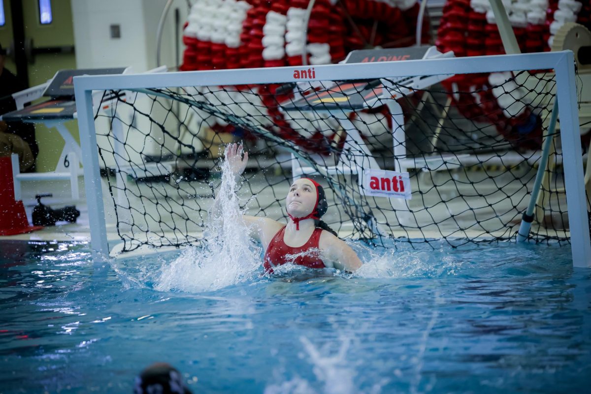 BLOCK. At the Aldine Tournament for water polo on Friday, Aug. 15, Anjali Sample (11) blocks the ball. Sample was later seen getting multiple blocks a game. “I felt really good,” Sample said. “I was able to get a lot of saves even though I was getting exhausted.”