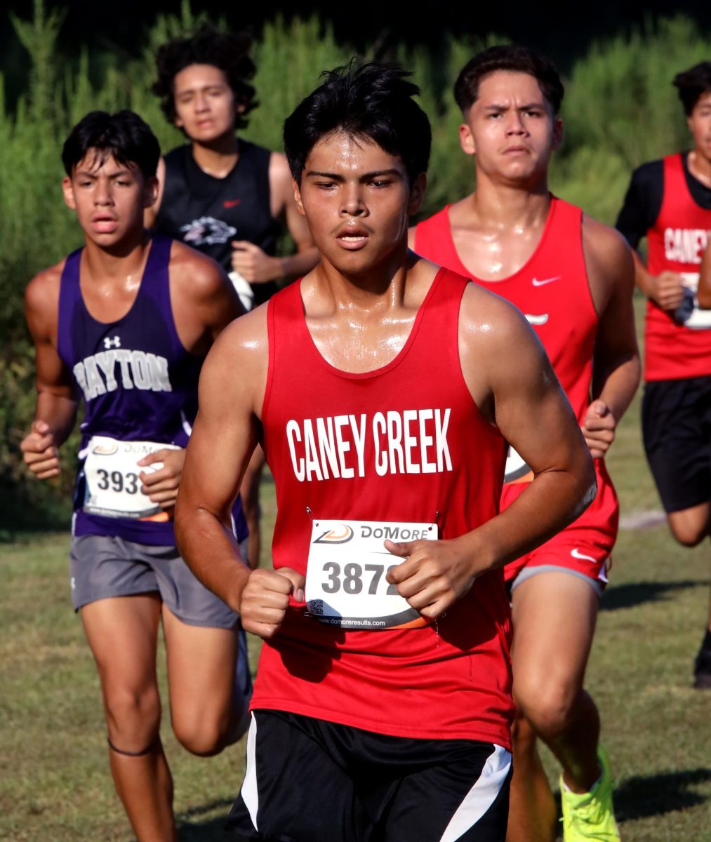 PANTHER COURAGE. Sophomore Esteban Sanchez pushes forward on his second lap on Sep.13 at the Dayton Invitational Meet. Sanchez would cross the finish line with his new personal best of 21:15 in the 5K Meter Run.