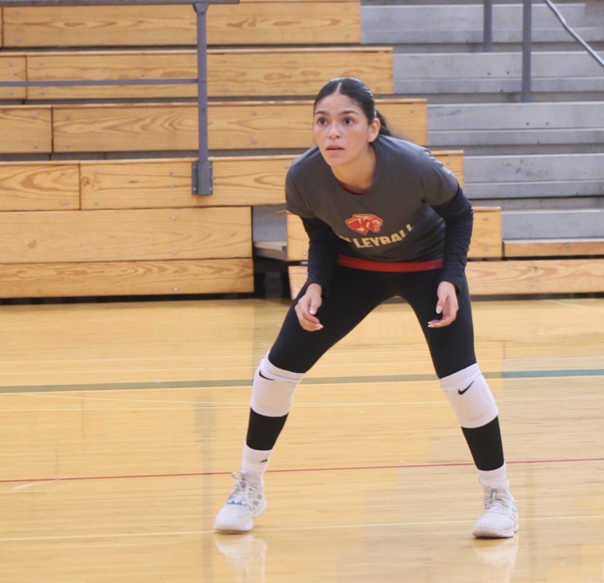 KEEPING UP. Before the game against The Woodlands Fernanda PerezNegron was waiting for her teammate to pass her the ball to go up for a hit. “I knew it was going to be tough competition but I had faith we could stay up with them,” PerezNegron said. 