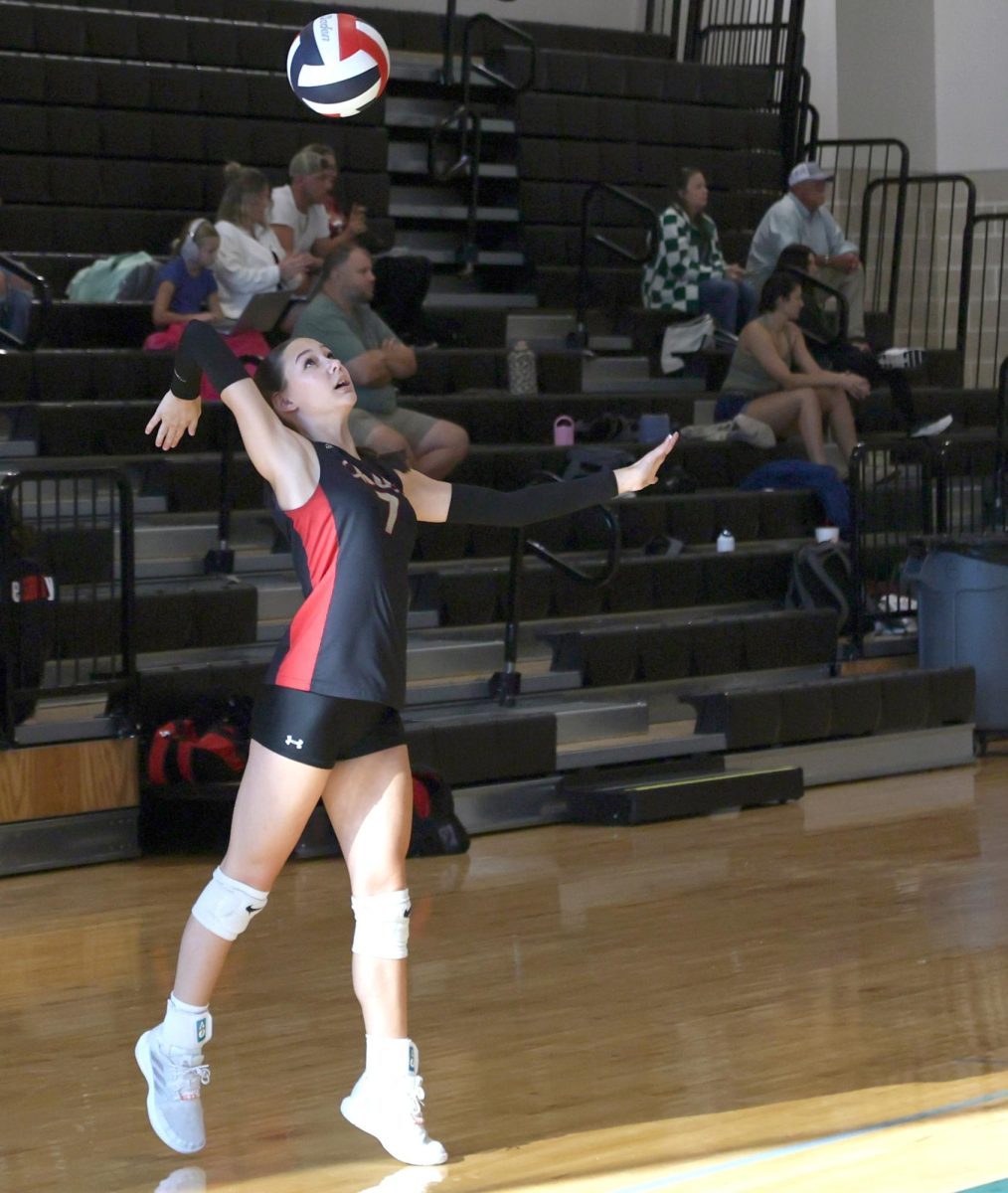 PERFECT SERVE. Sophomore Savanah Gianni was nervous about her serve to stop off the match. “My main goal is to hit the ball to the back, to prevent the ball going to the middle and the team being able to reset fast and score a spike on us,” Gianni said. 