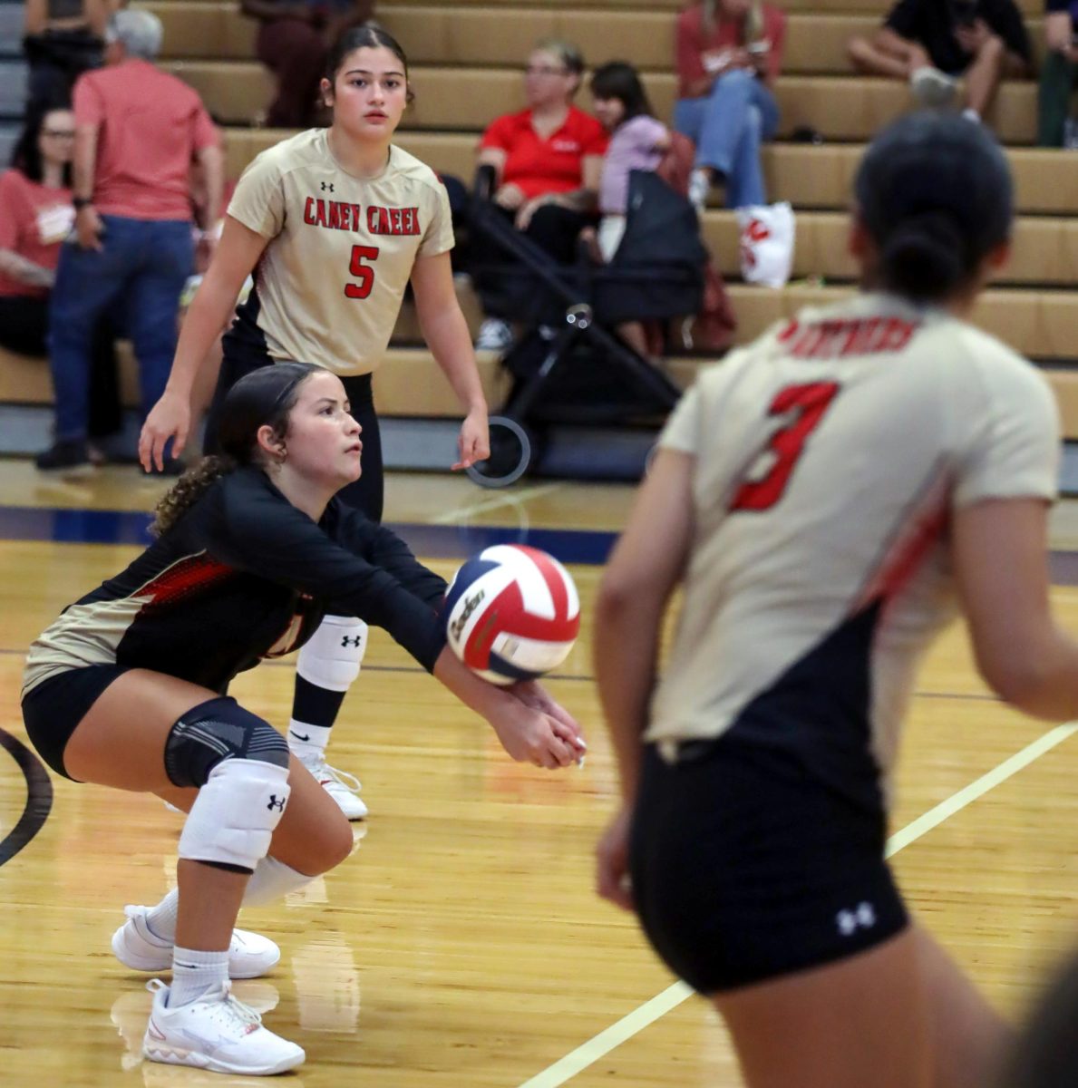QUICK RECOVERY. Junior Zulianette Rivera Lorenzo bumps the ball after it was served at the Volleyball V. Oak Ridge game on Sept. 19. Rivera immediately jumps back into action with her team to try and score a point.