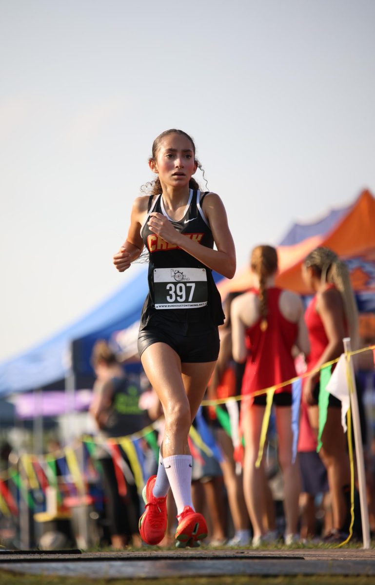 PRESSURE. Freshman Evanny Rodriguez made a statement, while she placed at Longhorn Stampede meet on Sep. 18, 2025.  “I was running and I was trying to catch up to the person in front of me,” Rodriguez said. “I have a lot of pressure because I wanna prove that I deserve to be on varsity as a freshman, and after the race I felt great because I won a medal.”