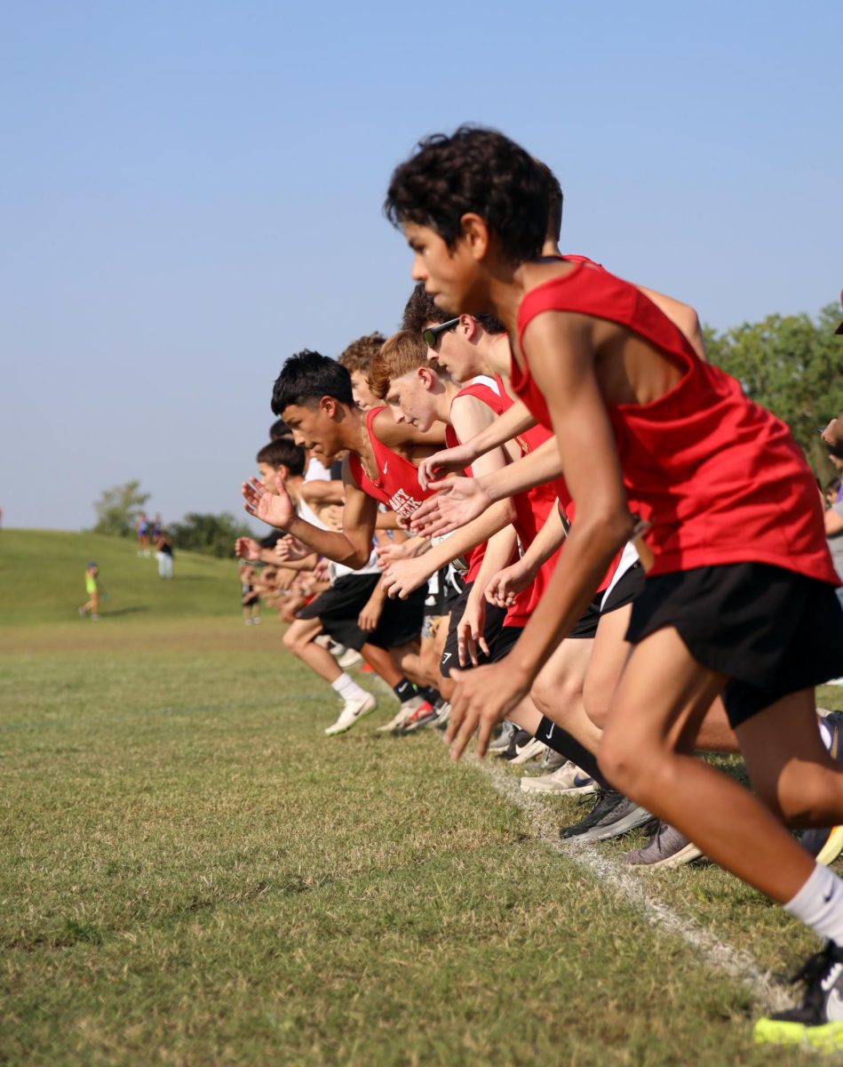 READY, SET, GO. Freshman Amari Domenget bolts as soon as the sound of the gun shot during the Longhorn Stampede meet on Sept. 18, 2025. Feeling excited at the meet he did well and set a new personal record while thinking about just passing the other racers. “I felt confident because I felt good that day. I was hydrated and excited for it just being at the meet and like running,” Domenget said. “I did good, I got a new personal record that was 22:14.”