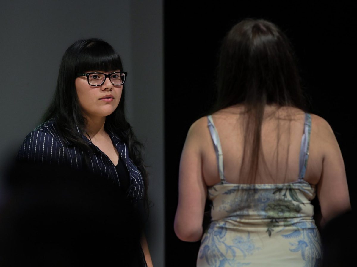 TAKING CHARGE. Senior Jourdanne Granados speaking to senior Alyssa Garduno, the vice president of NEHS on Sept. 9, 2025. “I feel like I gained a new responsibility. I have to be a good example for everyone but I'm still really proud to be a part of the club again this year.”