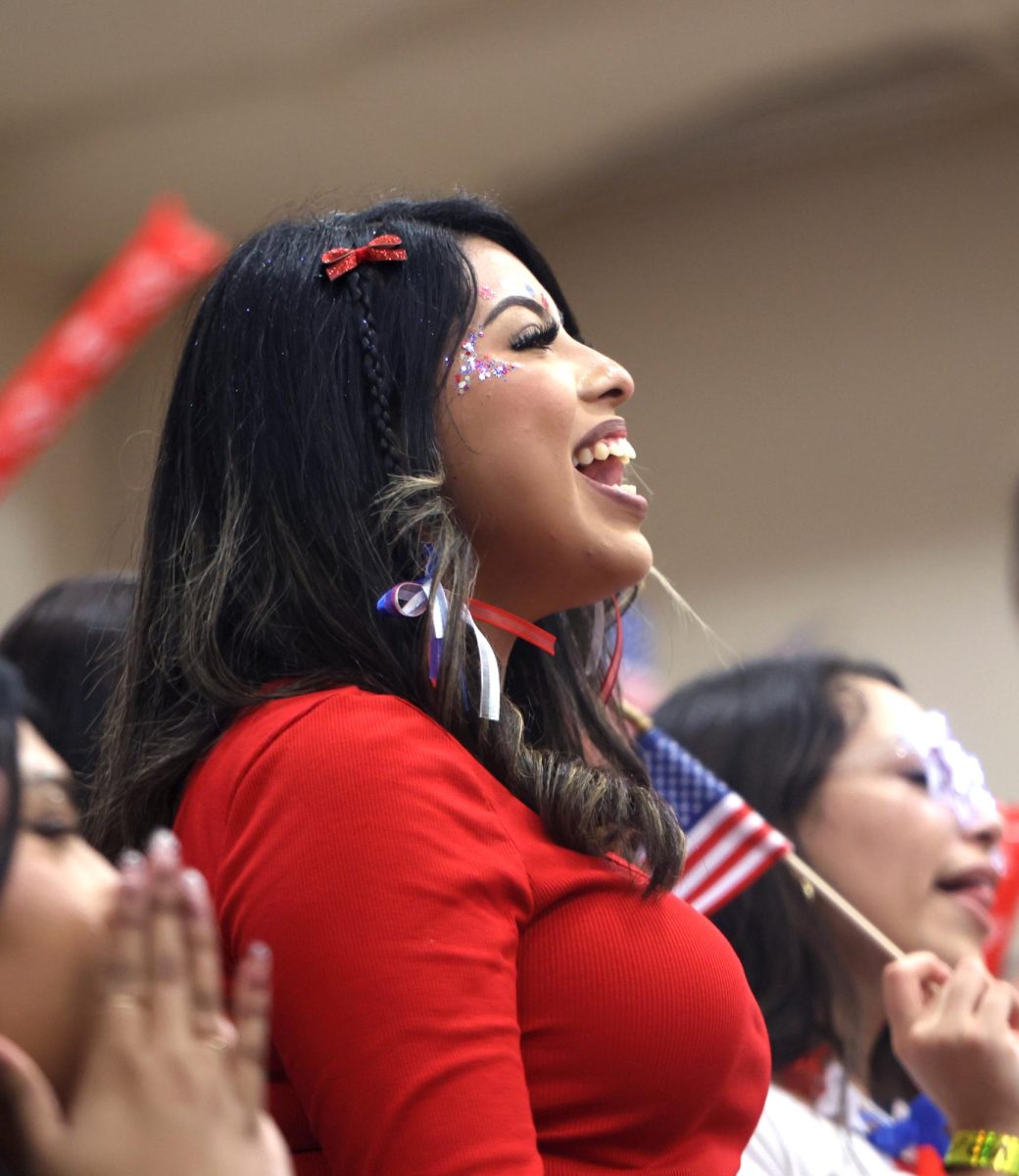 SENIOR ROAR. Senior Kimberly Rangel Gomez chants the new cheer back to the cheerleaders at the pep rally on Sept. 12, 2025. The seniors all scream and shout together to be the loudest because they want to win against every other grade level.