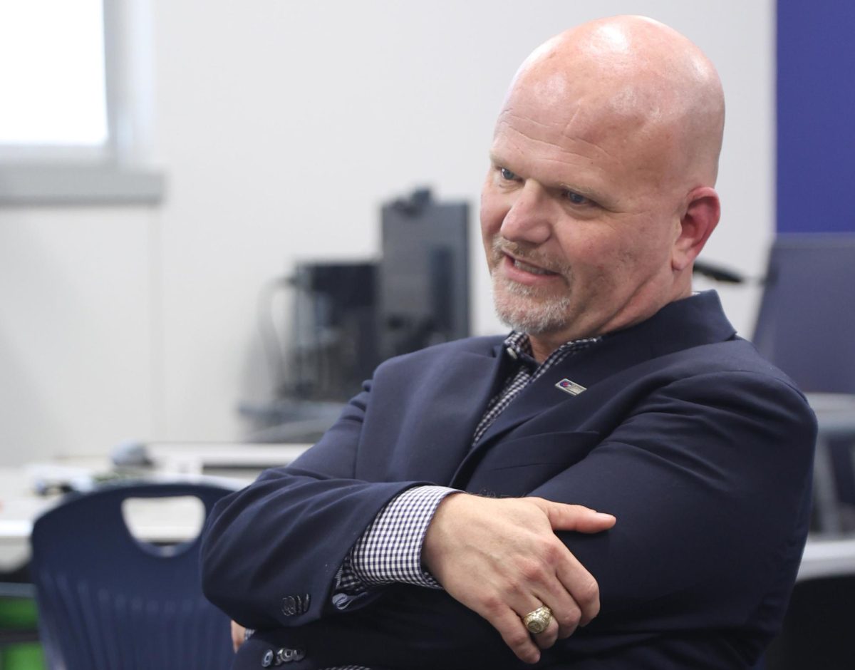 Superintendent David Vinson crosses his arms while speaking in a student press conference at the Conroe ISD Jett Center Oct. 23. Vinson invited representatives from every CISD high school. Four reporters attended.